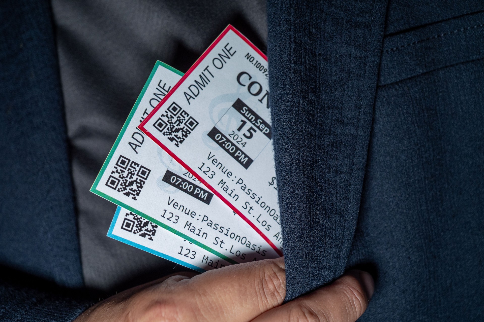 Close-up of a hand taking three tickets from a pocket,Ticket Scalping concept